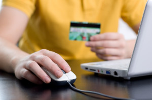 Online shopping concept, paying with a credit card