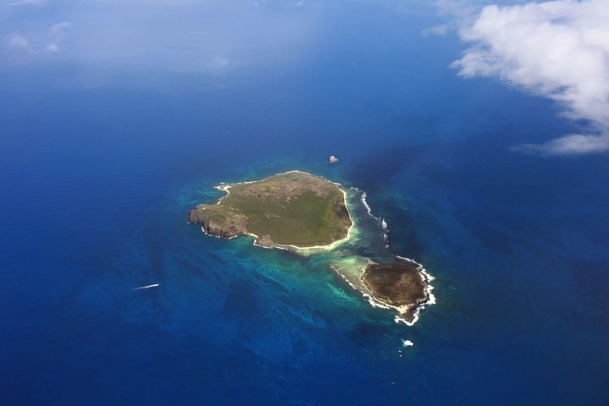 Aerial view of small island near to island Mauritius Aerial view of small island near to island Mauritius