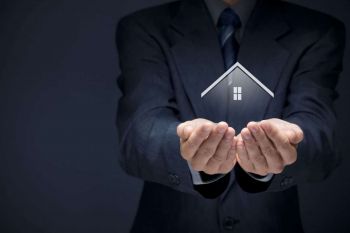Real estate agent offer house. Property insurance and security concept.
