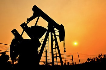 pumpjack pumping crude oil from oil well Grindelwald - Suiza