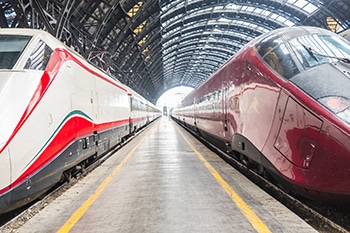 Modern high speed red commuter train at the railway station at s Grindelwald - Suiza